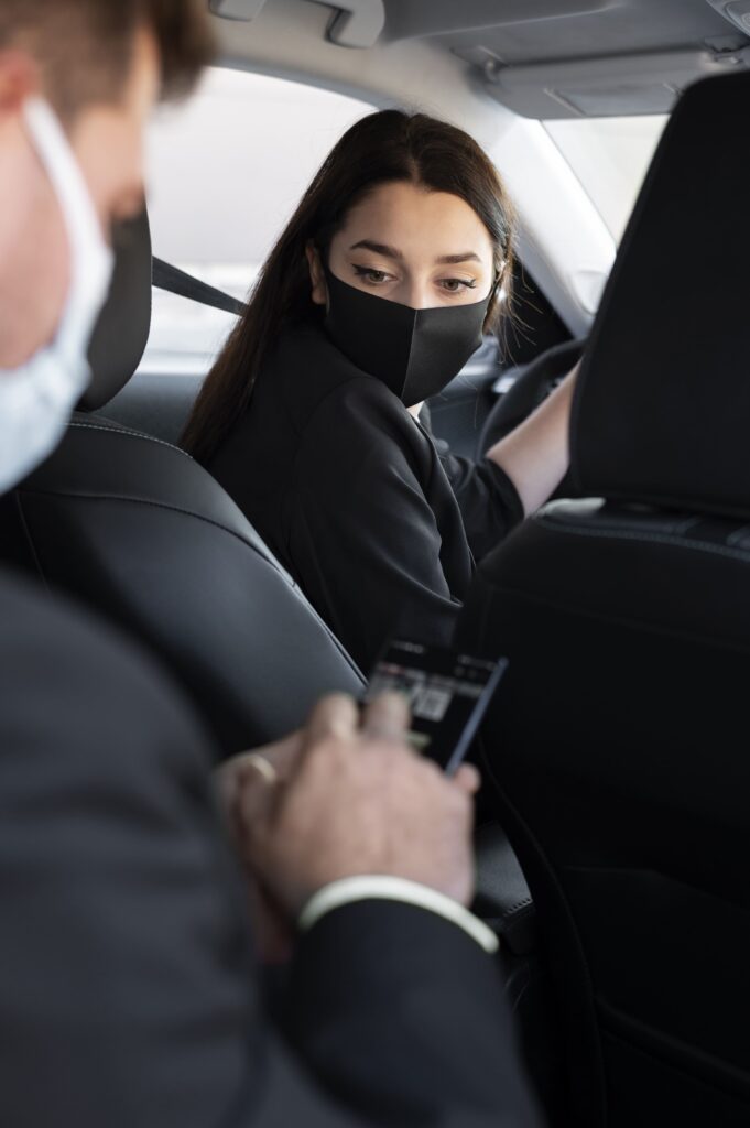 young-female-being-uber-driver-male-client